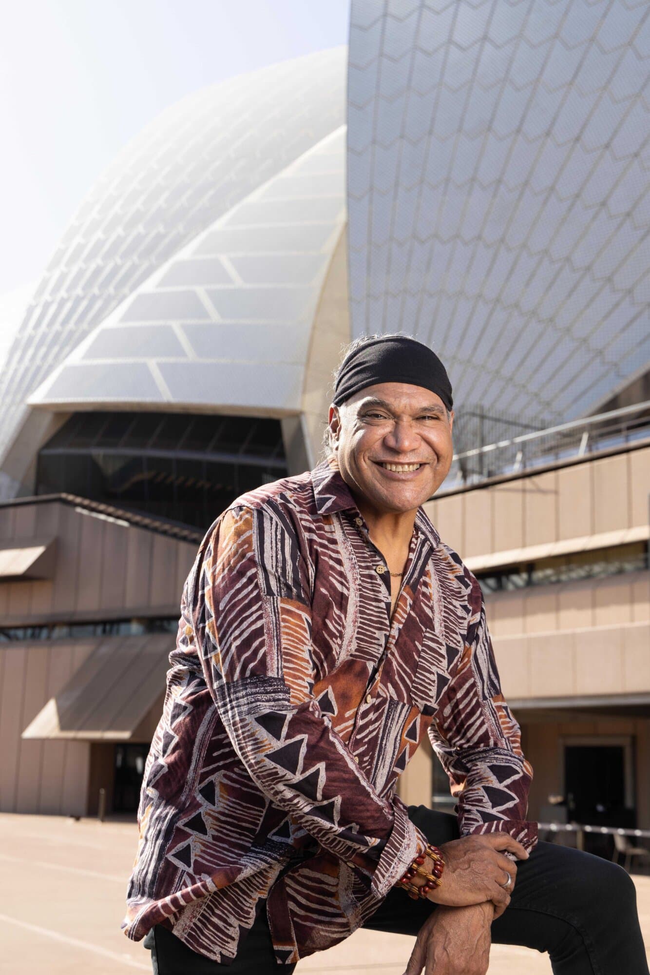 Mark Olive, aka ‘The Black Olive’, is Australia’s most celebrated indigenous chef.  Over the past 30 years he has become known around the world thanks to his skill and passion for fusing native ingredients with contemporary cooking, helping educate audiences about Australia's rich Indigenous culture and traditions in the process.

A Bunjalung man, Mark became interested in cooking as a child watching his mother and aunts prepare meals with traditional plants like Wattle seed and Lemon Myrtle while growing up in and around Wollongong on Australia's south coast.
By the 1990s Mark had opened his own restaurant in the heart of Sydney's CBD - the menu oozing with Indigenous ingredients which, at that time, most Australians had never heard of, let alone tasted, for themselves.

Taking a short break from chef life, Mark moved to Melbourne to study acting and theatre which led to him directing his first film "Passing Through", exploring issues of identity, culture and family. It wasn't long before Mark decided to combine his passions for food and storytelling, creating and starring in his ground-breaking television series “The Outback Café", which can still be seen on screens internationally.

In addition to cooking, Mark has had a successful media career starting in The Outback Café and as a trusted expert and consummate co-host and guest on programs such as “A Chef’s Line”, “On Country Kitchen” and “Good Cooks”, “The Celebrity Apprentice”, “The Cook Up with Adam Liaw” and “Big Mob Brekky.

Mark's incredible knowledge for Indigenous Australian cuisine and culture sees him in high demand by corporate clients and tourism bodies around the world. In 2010, as part of Oprah’s 'Ultimate Australian Adventure', the American talk show queen's lucky guests were treated to a cooking demonstration by Mark.
In his spare time, he loves spending time working in his hometown of Wollongong offering Indigenous food experiences at his popular boutique café “The Farm Kiosk” at Killalea State Park on Dharawal Country.